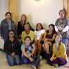 women from the international women's day in tuba city, arizona posing for a photo smiling
